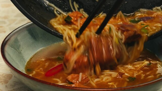 Vietnam traditional pho bo soup on delivery, Beef noodles. Pho Bo Soup with beef, rice noodles, ginger, lime, chili pepper in bowl. Vietnamese cuisine. Pho Noodle Soup restaurant Close-up.
