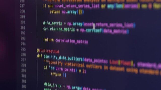 Python code fills dark screen with colorful syntax highlighting. Code editor displays configuration, security, logging, and data analysis functions, suggesting vibe coding with AI assistance.