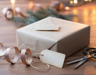 Fototapeta premium Crafting a holiday gift with wrapping paper and ribbon