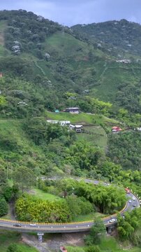 La Estampilla Viaduct Engineering Structure above Mountain Landscape near Manizales, Colombia. Aerial View. Vertical Video.