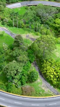 La Estampilla Viaduct with Traffic near Manizales, Colombia. Establishing Shot. Aerial View. Vertical Video.