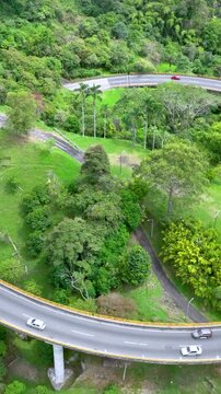 La Estampilla Horseshoe Viaduct near Manizales, Colombia. Establishing Shot. Aerial View. Vertical Video.