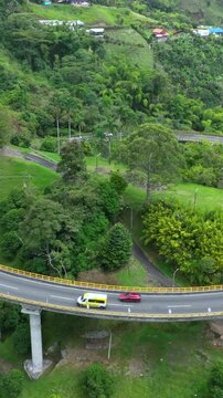 La Estampilla Viaduct Engineering Structure above Mountain Landscape near Manizales, Colombia. Aerial View. Vertical Video.
