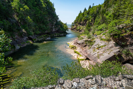 View looking down Point Wolfe River toward the Bay of Fundy along Point Wolfe Road near Alma, New Brunswick, Canada, July 2026.