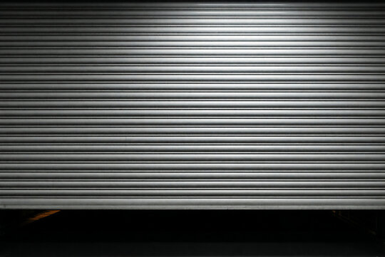 Industrial metal roller shutter door closed