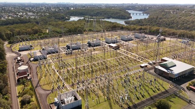 Aerial drone view of a large electrical distribution substation for the generation and supply of energy to households and industry located at Picnic Point in Sydney, NSW Australia  