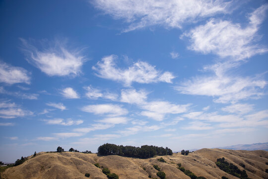 California hill with clouds