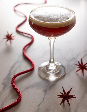 festive manhattan cocktail with foam 