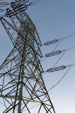 High voltage power infrastructure in open landscape.