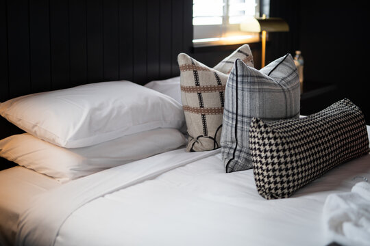 Cozy Bedroom Interior With Decorative Throw Pillows