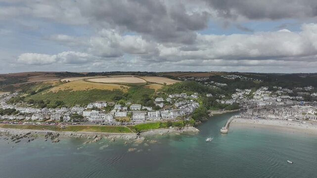 Beach and Cliffs over Looe Bay from a drone, Looe, River Looe, Cornwall, England, United Kingdom
