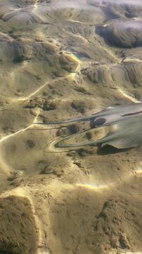 Stingray gliding over sandy ocean floor in clear tropical waters Egypt. Hurghada.Siva Golden Bay Makadi