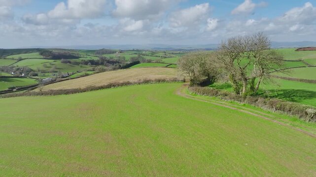 Fields and Farmlands at spring from a drone, Devon, England, United Kingdom