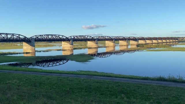 A long bridge reflected in the sky over a wide river, Langenfeld, D&ouml;mitzer Br&uuml;cken, World War II, Elbe, Wendland, Lower Saxony, Germany