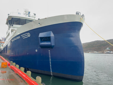 Newfoundland, Canada - October 1, 2026: A large blue-and-white vessel, Ronja Challenger, is moored in St. John's Harbour. The wellboat is used to clean and treat salmon for parasites and lice.