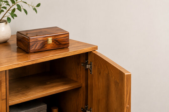 Open wooden storage cabinet with polished wood box, organization and craftsmanship concept