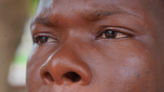 Close up sequence focusing on detailed features and textures of woman facial profile. subject remains in view with consistent natural skin details no significant movement or change
