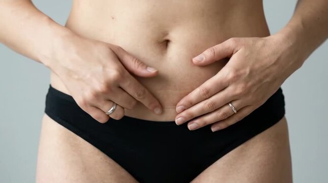High Resolution Professional Medical Style Photo of a Woman Abdomen with a Cesarean Section Scar