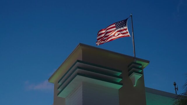 American flag waving in the wind. Flag of the USA. National waving flag of united states outdoor. Independence day. Patriotic symbol. American Flag for Memorial Day or 4th of July