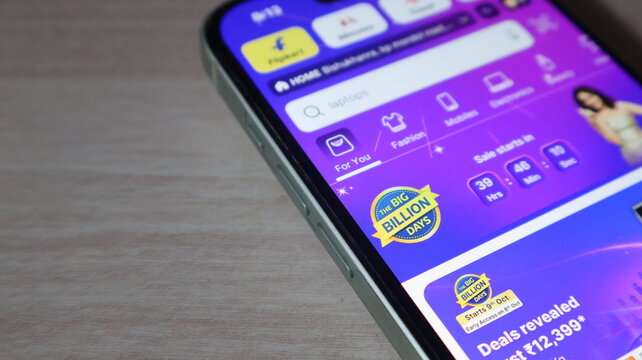 Smartphone screen showing shopping application interface with e commerce branding and big billion days sale countdown timer.