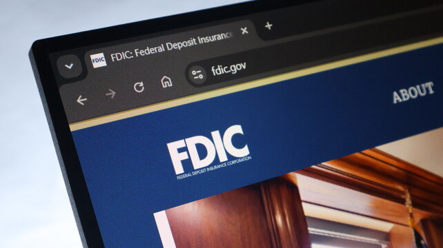 Federal deposit insurance corporation website displayed on computer screen showing official fdic logo for banking security.