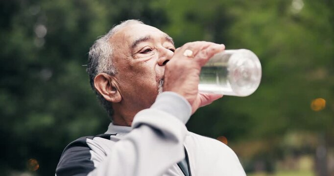Senior, man and fitness with water in park for hydration, workout break or outdoor recovery. Active, elderly or male person with mineral liquid, drink or thirst for nutrition, rest or sustainability