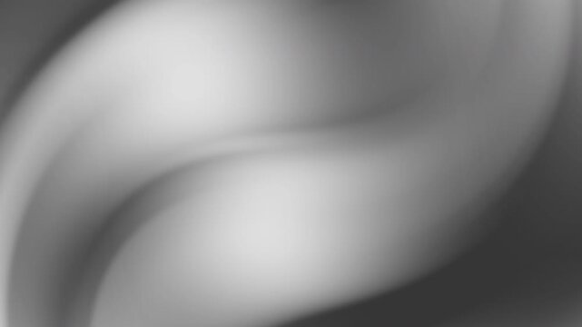 Abstract gradient design with soft gray wave patterns and shadows, suitable for backgrounds, digital art, printing, and web graphics.