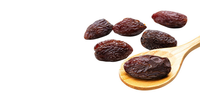 Sweet dried dates fruit with wooden spoon isolated, transparent PNG cutout
