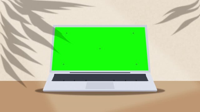 Laptop computer with green screen chroma key display on desk office mockup