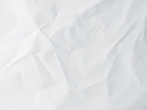 Blank clean white wrinkled paper sheet background. Old crumpled white paper texture surface pattern. Abstract empty white sheet paper background texture.