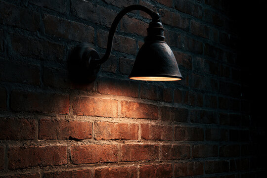 Classic comedy stage with brick wall backdrop, a bright center spotlight highlighting the stage floor, no furniture or props.