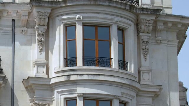 Ornate Stone Facade and Balconies of Historic European Building