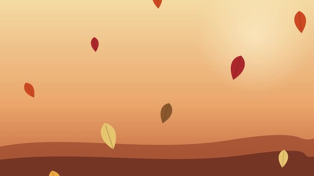 Colorful autumn leaves falling down in a soft warm orange light during the fall season time