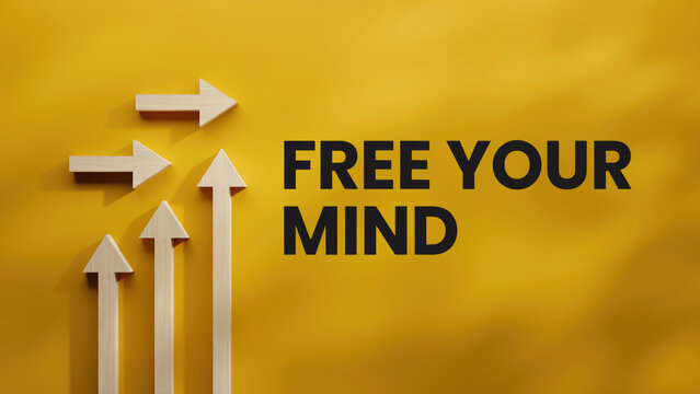 Wooden arrows pointing upwards and to the right on a yellow background with the text free your mind with arranged upward rightward rightward pattern bright development
