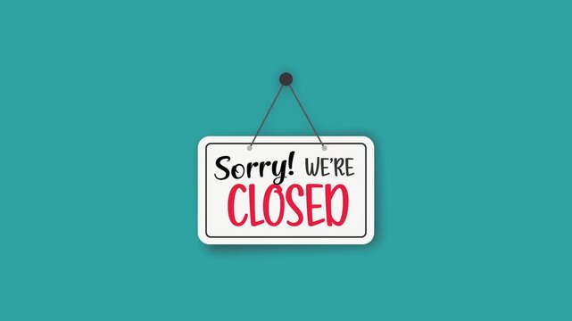 Vibrant Sorry We re CLOSED sign hanging on a teal background, indicating temporary business unavailability.