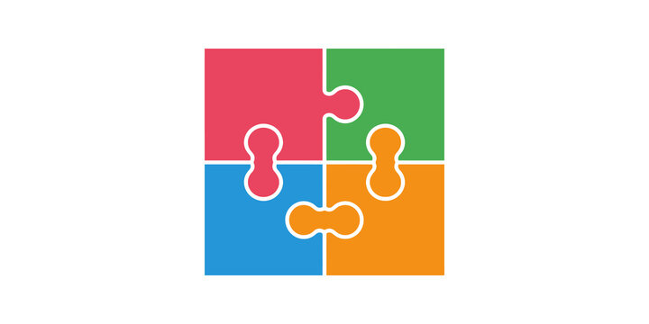 Four bright puzzle pieces arranged together representing teamwork and ideas.