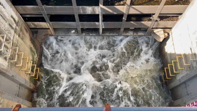 Sluice gates have been opened to allow water to flow into the Nong Bon retention basin&mdash;addressing flooding in eastern Bangkok&mdash;before the water is diverted into the giant drainage tunnel for discharge