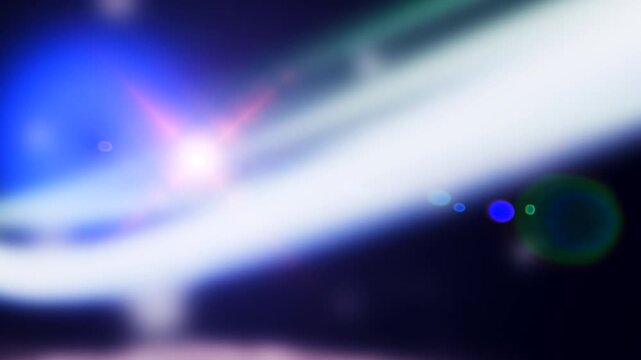 Dynamic motion of light streaks with vibrant lens flares and sharp rendering.