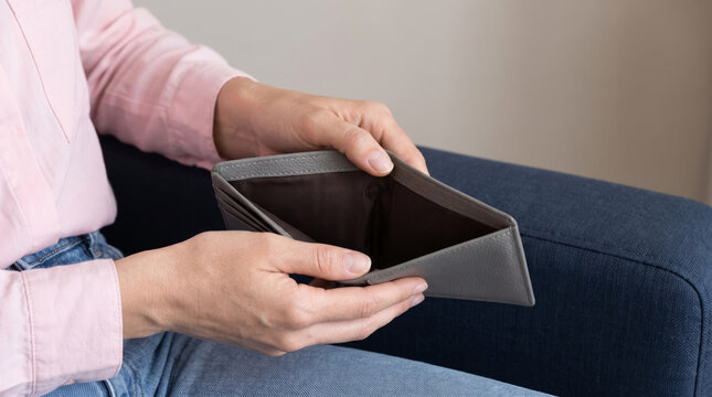 Empty wallet reveals inflation pressure and financial concern. Economy finance recession crisis. bankruptcy debt loss broke, poverty poor unemployment, money budget saving
