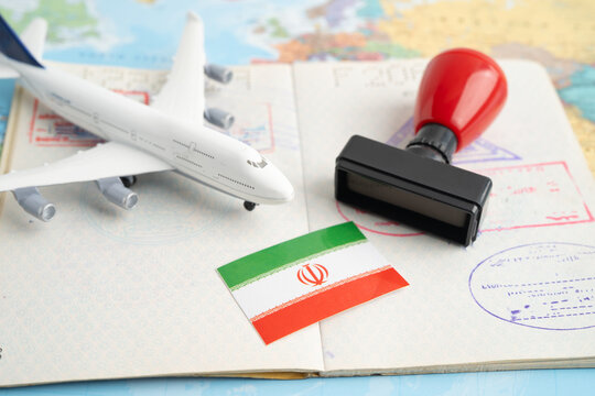 Iran passport with approved stamp on document for tourism to immigration at airport in country.