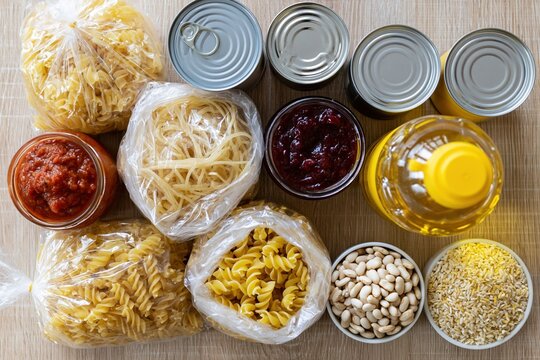 The Pantry Essentials: A Colorful Display of Pasta, Cans, Oils, and Grains