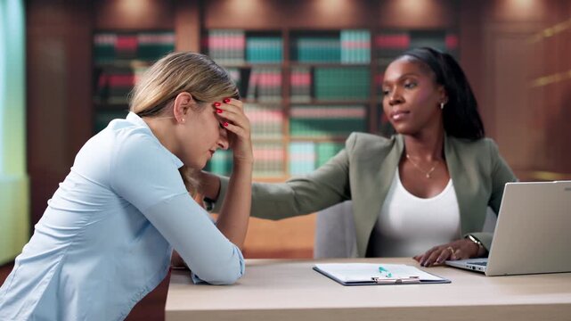 Female Lawyer Consulting A Young Client During Wrongful Death Case