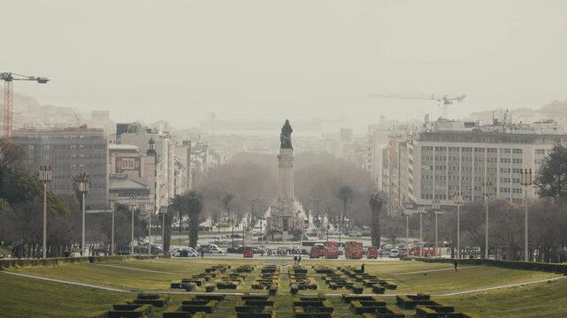 Eduardo VII Park With Marques De Pombal Square Monument In The Background In Lisbon, Portugal. - wide shot