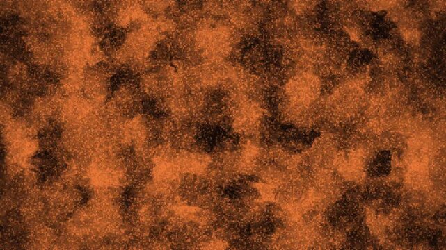 Abstract orange and black grunge texture background with a gritty
