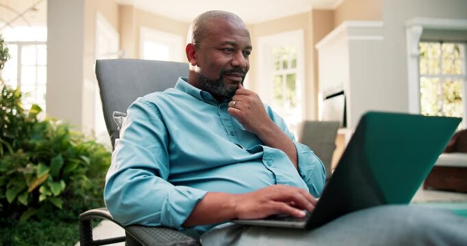 Laptop, remote work and black man at holiday villa for thinking, blogging and internet connection. Smile, technology and digital nomad with idea for workcation, travel and online workload at resort