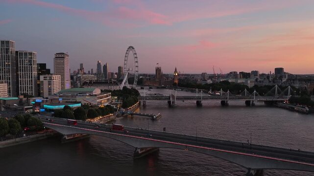 Westminster and central London viewed from the air near Waterloo Bridge, showing the River Thames, riverside buildings and the mix of historic and modern architecture across the capital, England.