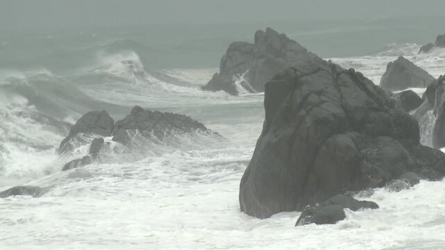 Large Waves Crashing Onto Rocky Coastline In Storm - Saola