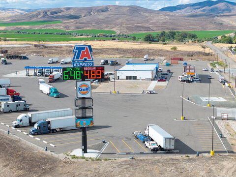 Truck stop with large parking area and fuel pumps