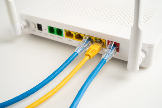 Ethernet cable with wireless router connect to internet service provider network.