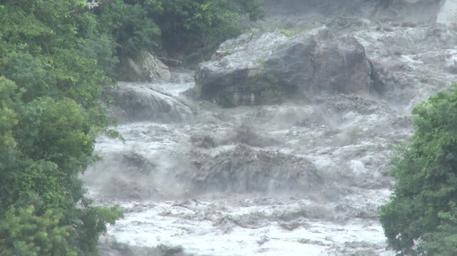 Fast Flowing Flood Waters In River After Hurricane Drop Heavy Rain Tembin